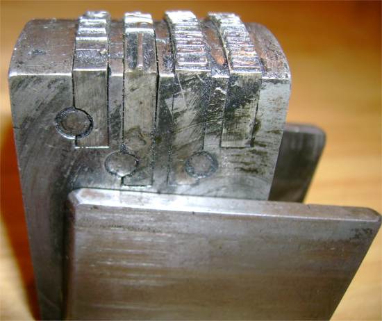 Open four line Krag Dater Die showing fittings
for Place, Time and Date slugs